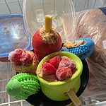 a bowl filled with fruit and covered in ice